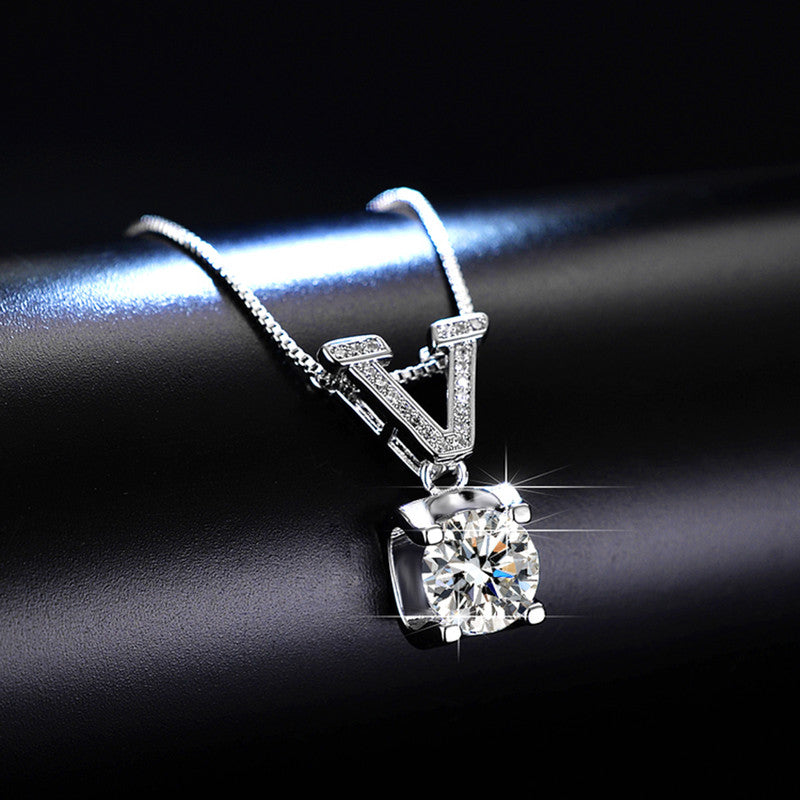 Jewels Galaxy Silver Plated Crystal Studded V Shape Circular Solitaire Pendant