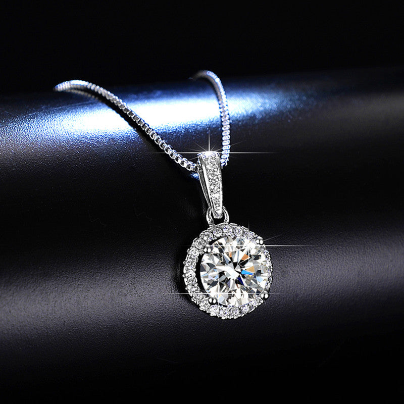 Jewels Galaxy Silver Plated Crystal Studded Circular Shape Solitaire Pendant