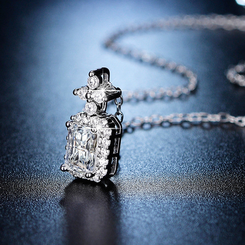 Jewels Galaxy Silver Plated Crystal Studded Geometrical Anti Tarnish Solitaire Pendant