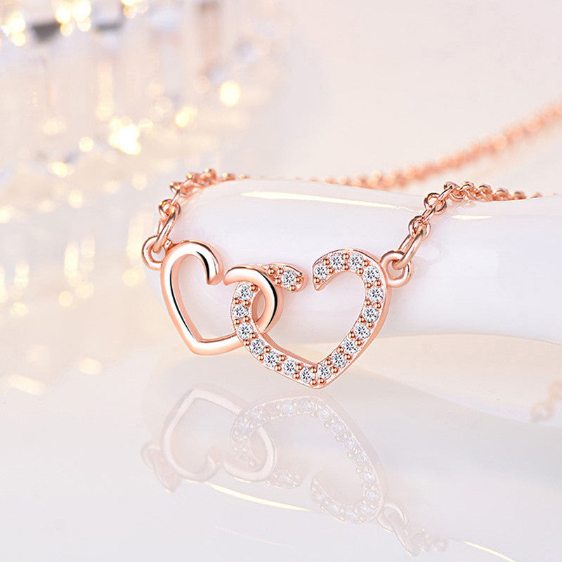 Jewels Galaxy Rose Gold Plated American Diamond Studded Dual Heart Contemporary Korean Pendant