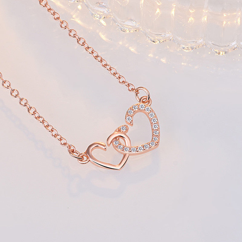 Jewels Galaxy Rose Gold Plated American Diamond Studded Dual Heart Contemporary Korean Pendant