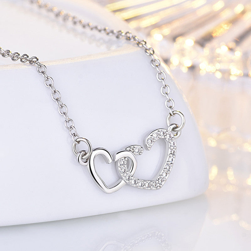 Jewels Galaxy Silver Plated American Diamond Studded Dual Heart Contemporary Korean Pendant