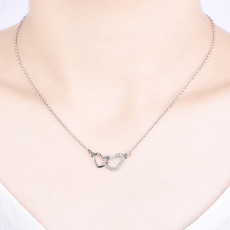 Jewels Galaxy Silver Plated American Diamond Studded Dual Heart Contemporary Korean Pendant