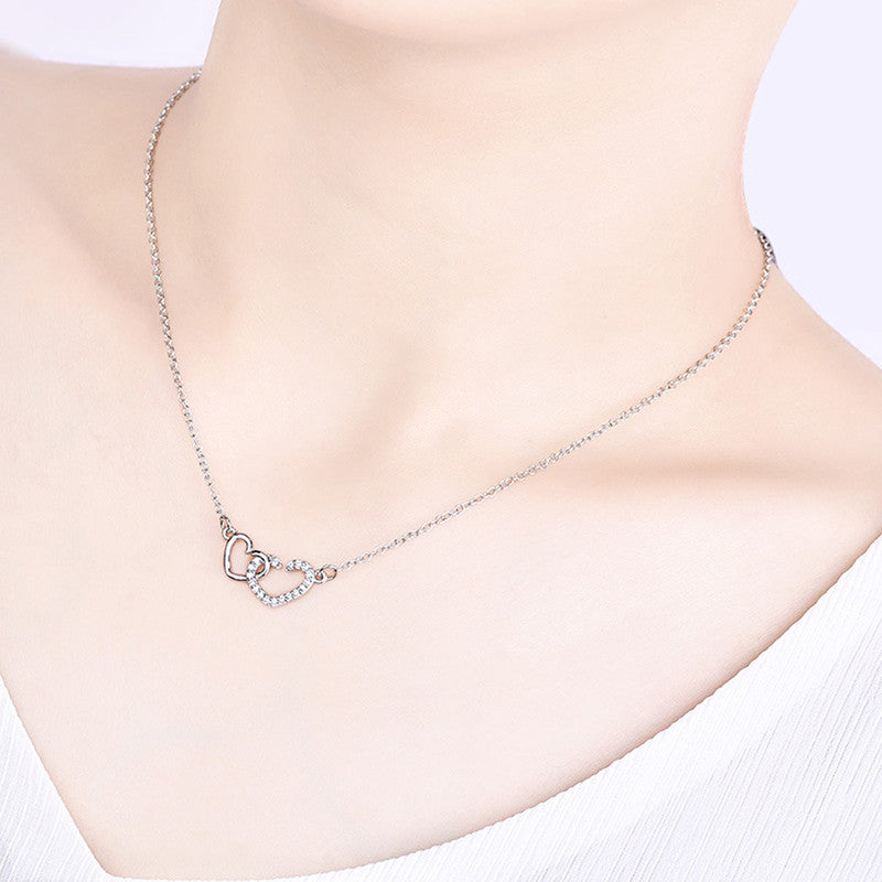 Jewels Galaxy Silver Plated American Diamond Studded Dual Heart Contemporary Korean Pendant