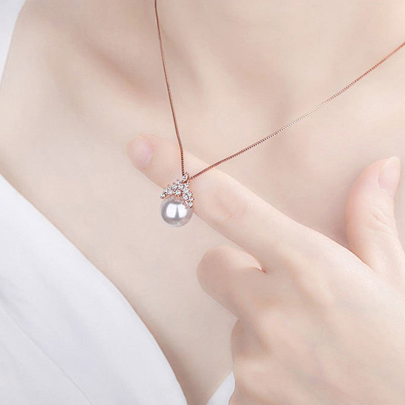 Jewels Galaxy Rose Gold Plated AD Studded Crown Like Pearl Studded Korean Pendant
