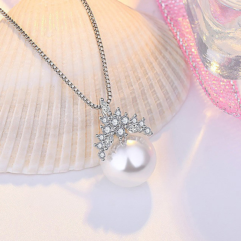 Jewels Galaxy Silver Plated American Diamond Studded Crown Like Pearl Studded Korean Pendant