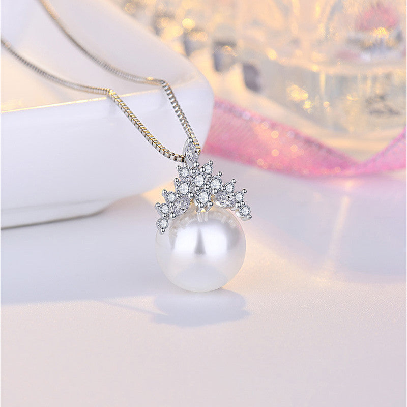 Jewels Galaxy Silver Plated American Diamond Studded Crown Like Pearl Studded Korean Pendant