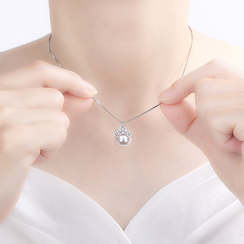 Jewels Galaxy Silver Plated American Diamond Studded Crown Like Pearl Studded Korean Pendant