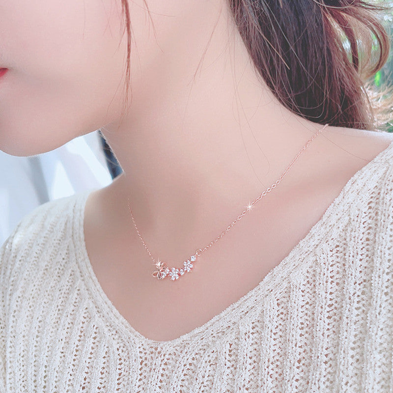Jewels Galaxy Rose Gold Plated American Diamond Studded Bow-Tie Themed Contemporary Pendant