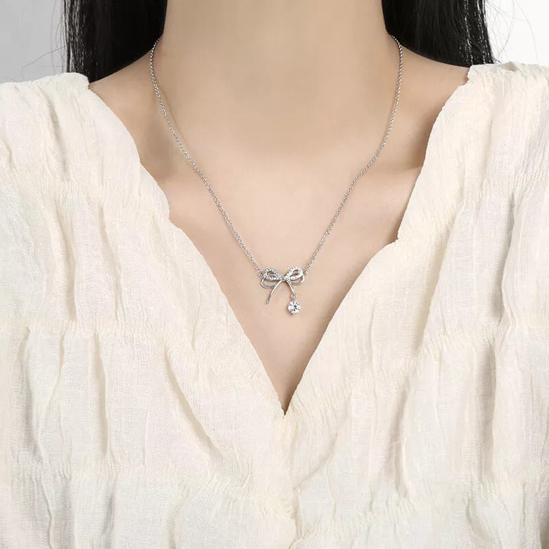 Jewels Galaxy Silver Plated American Diamond Studded Infinity Shape Korean Pendant