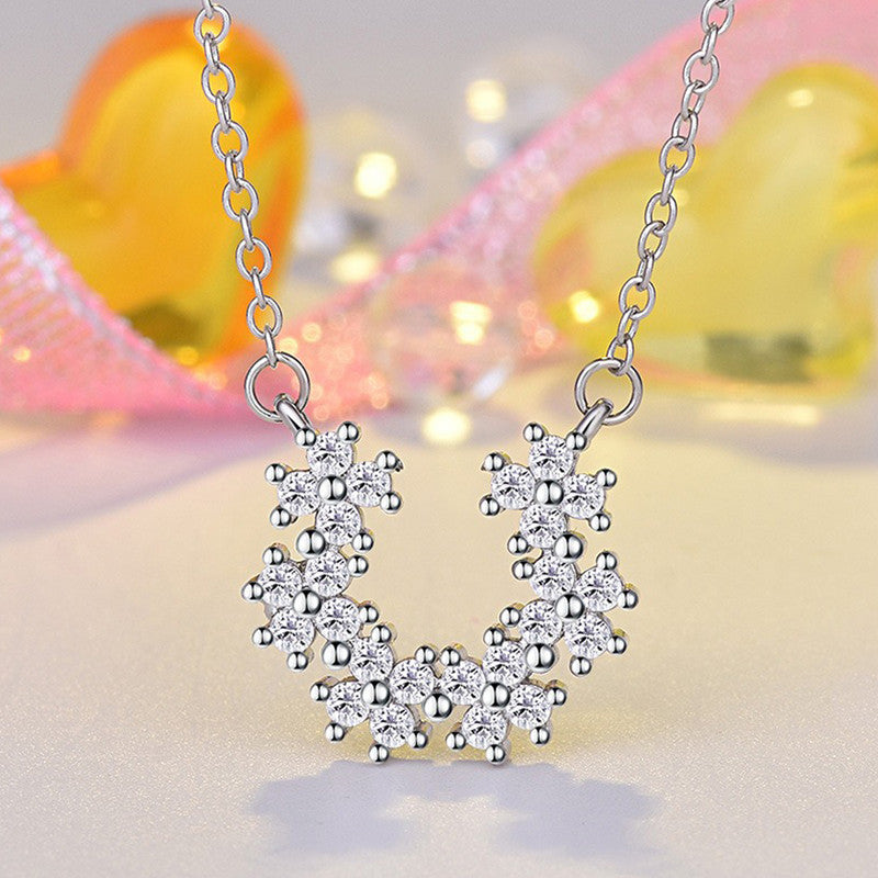 Jewels Galaxy Silver Plated American Diamond Studded Half Hoop Floral Pendant