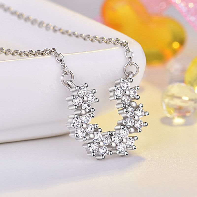 Jewels Galaxy Silver Plated American Diamond Studded Half Hoop Floral Pendant