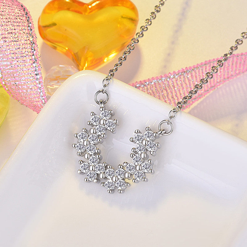 Jewels Galaxy Silver Plated American Diamond Studded Half Hoop Floral Pendant
