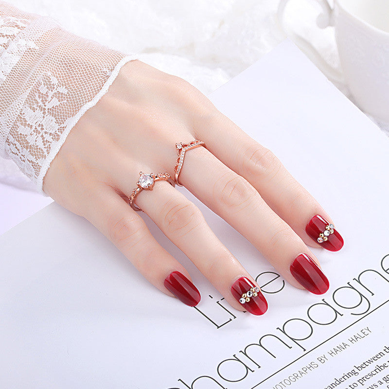 Jewels Galaxy Rose Gold Plated AD Studded Crown Shape Contemporary Korean Finger Ring