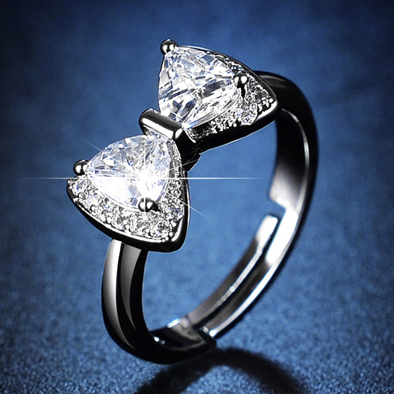 Jewels Galaxy Silver Plated Crystal Studded Bow Tie inspired Anti Tarnish Adjustable Ring
