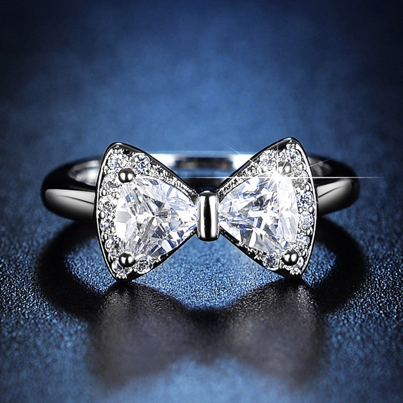 Jewels Galaxy Silver Plated Crystal Studded Bow Tie inspired Anti Tarnish Adjustable Ring