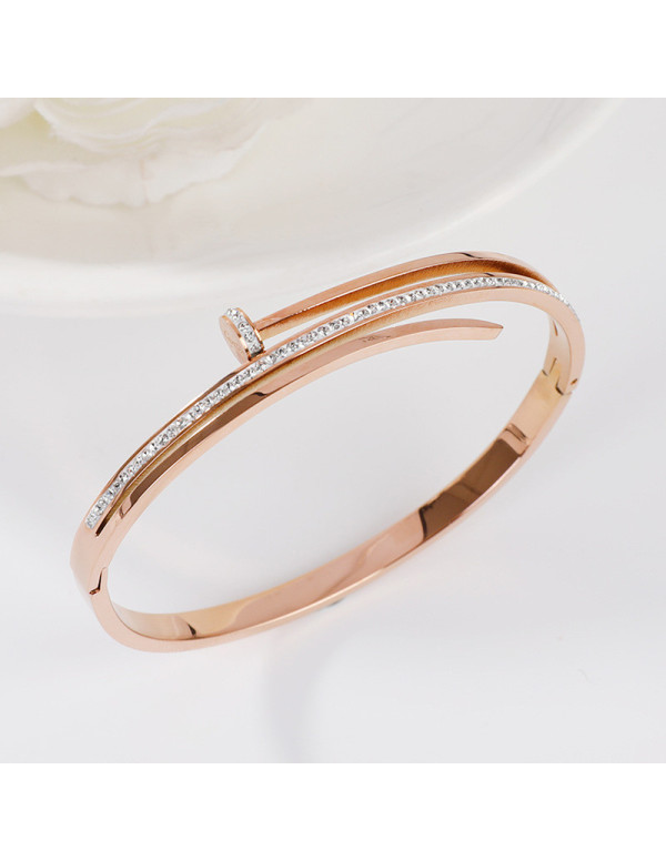 Jewels Galaxy Stainless Steel Rose Gold Plated American Diamond Studded Nail inspired Bracelet