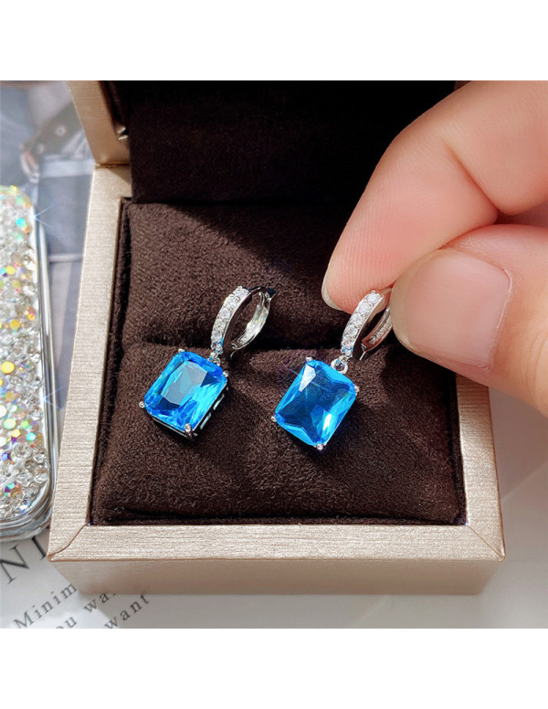 Jewels Galaxy Silver Plated Blue Rectangular American Diamond Studded Crushed Ice Cut Drop Earrings