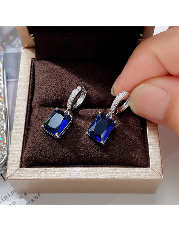 Jewels Galaxy Silver Plated Navy Blue Rectangular AD Studded Crushed Ice Cut Drop Earrings