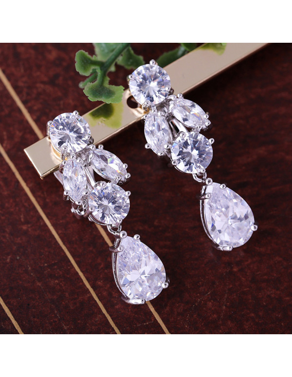 Jewels Galaxy Silver Plated American Diamond Studded Contemporary Crushed Ice Cut Drop Earrings