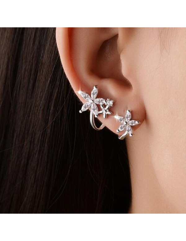 Jewels Galaxy Silver Plated American Diamond Studded Triple Star Shaped Earrings