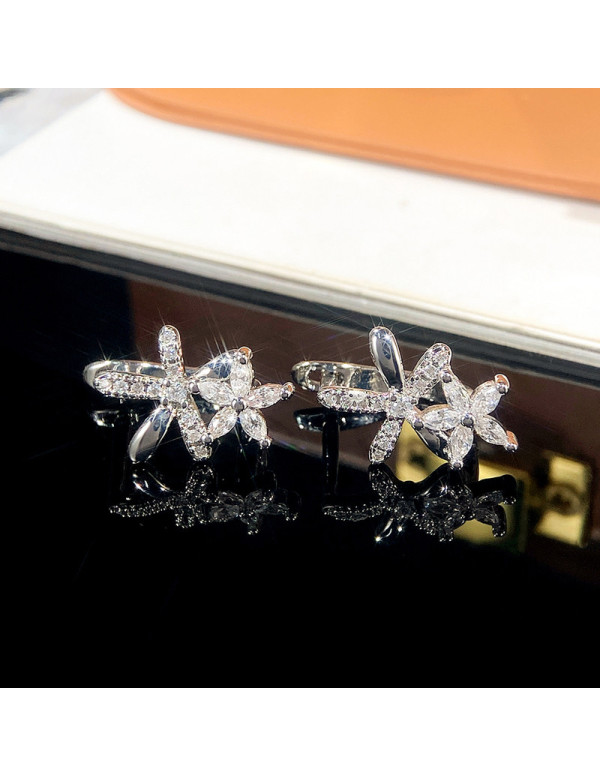 Jewels Galaxy Silver Plated American Diamond Studded Dual Star Shaped Earrings