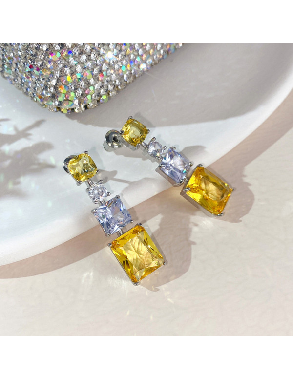 Jewels Galaxy Silver Plated AD Studded Yellow Geometrical Crushed Ice Cut Drop Earrings