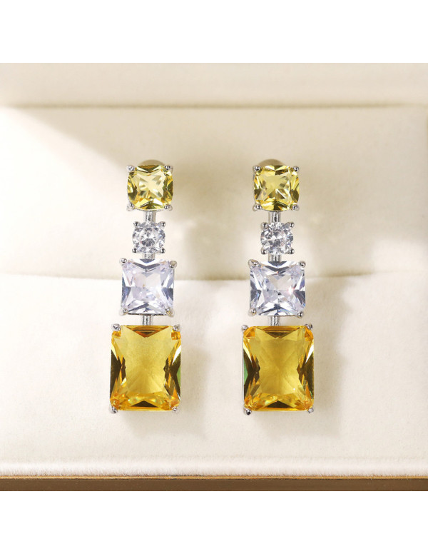 Jewels Galaxy Silver Plated AD Studded Yellow Geometrical Crushed Ice Cut Drop Earrings