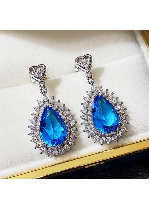 Jewels Galaxy Silver Plated American Diamond Studded Blue Teardop Shape Ice Cut Drop Earrings