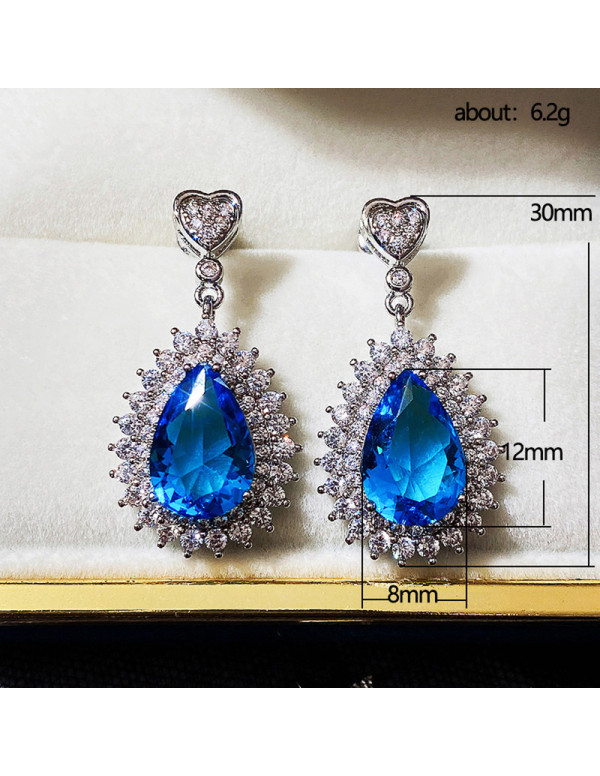 Jewels Galaxy Silver Plated American Diamond Studded Blue Teardop Shape Ice Cut Drop Earrings