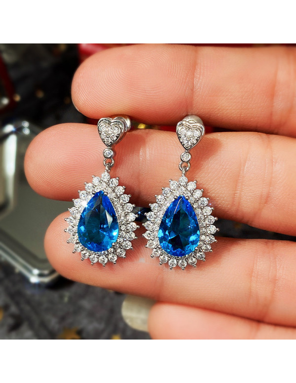 Jewels Galaxy Silver Plated American Diamond Studded Blue Teardop Shape Ice Cut Drop Earrings