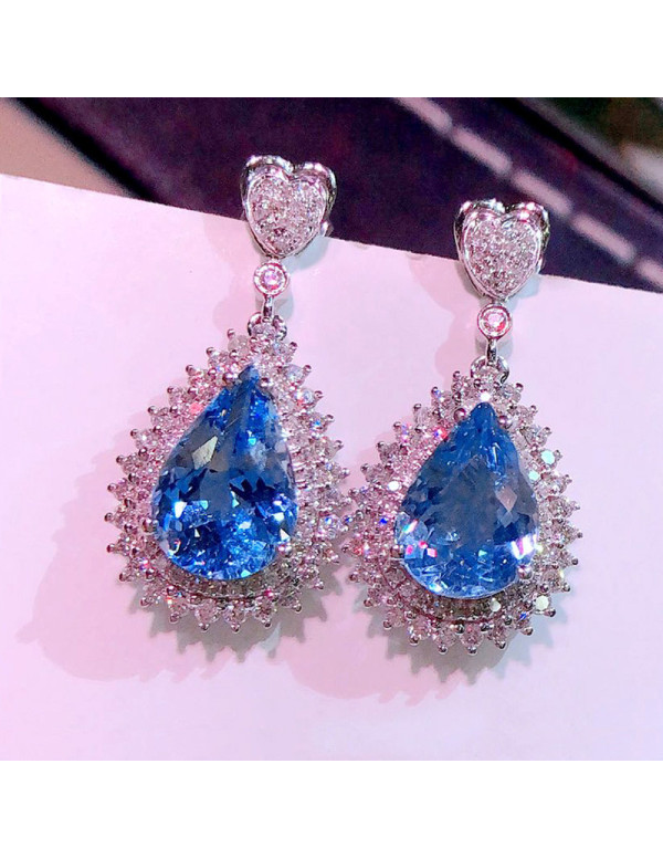 Jewels Galaxy Silver Plated American Diamond Studded Blue Teardop Shape Ice Cut Drop Earrings