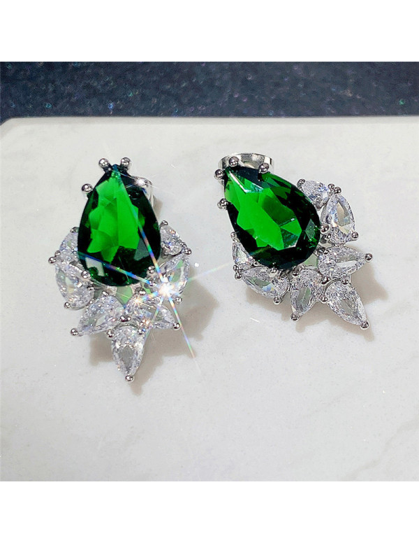 Jewels Galaxy Silver Plated American Diamond Studded Green Crushed Ice Cut Drop Earrings