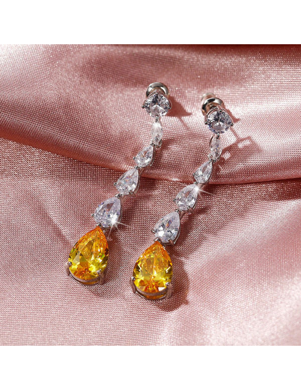 Jewels Galaxy Silver Plated AD Studded Yellow Teardrop Shape Crushed Ice Cut Drop Earrings