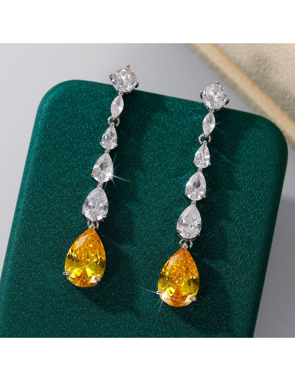 Jewels Galaxy Silver Plated AD Studded Yellow Teardrop Shape Crushed Ice Cut Drop Earrings