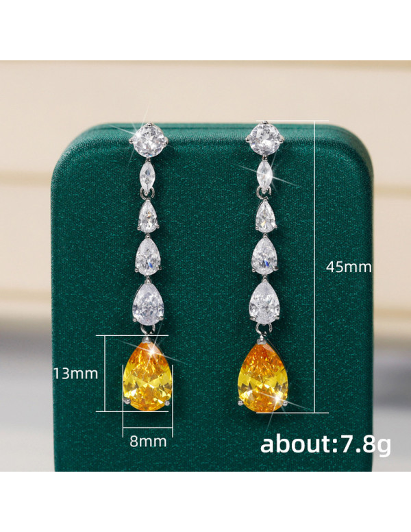 Jewels Galaxy Silver Plated AD Studded Yellow Teardrop Shape Crushed Ice Cut Drop Earrings