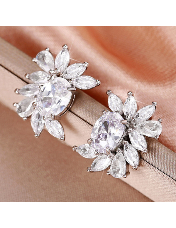 Jewels Galaxy Silver Plated American Diamond Studded Crushed Ice Cut Stud Earrings