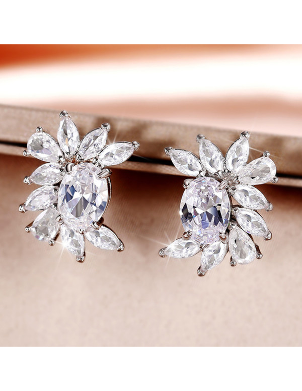 Jewels Galaxy Silver Plated American Diamond Studded Crushed Ice Cut Stud Earrings