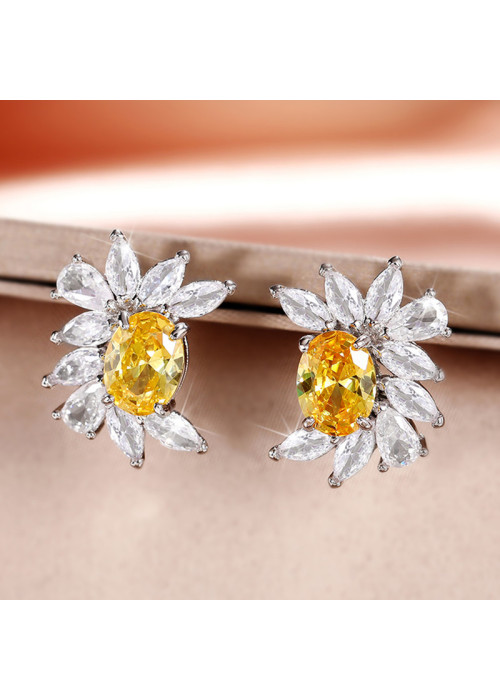 Jewels Galaxy Silver Plated American Diamond Studded Yellow Crushed Ice Cut Stud Earrings