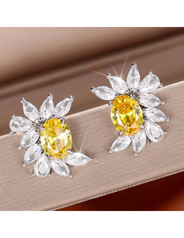 Jewels Galaxy Silver Plated American Diamond Studded Yellow Crushed Ice Cut Stud Earrings