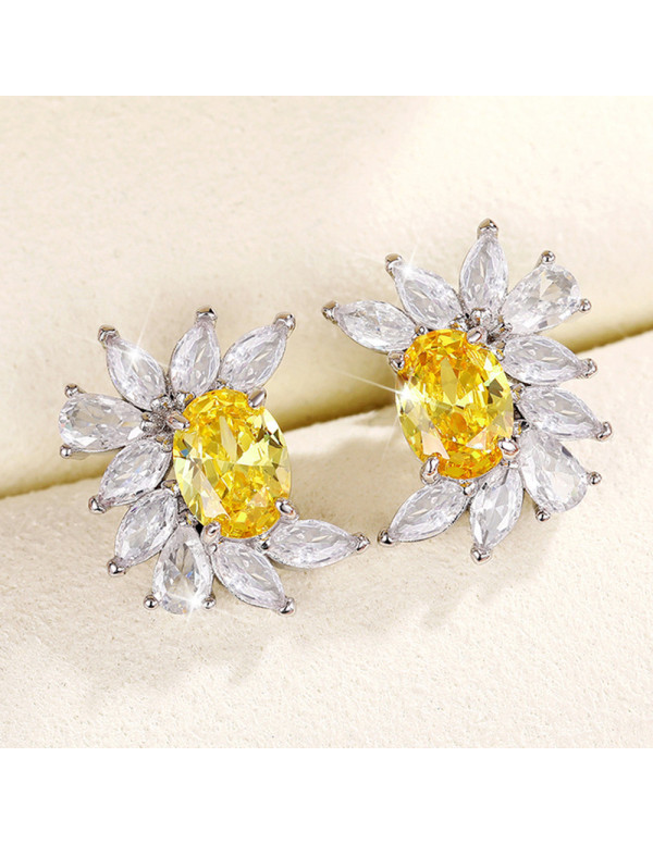 Jewels Galaxy Silver Plated American Diamond Studded Yellow Crushed Ice Cut Stud Earrings