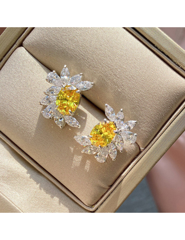 Jewels Galaxy Silver Plated American Diamond Studded Yellow Crushed Ice Cut Stud Earrings