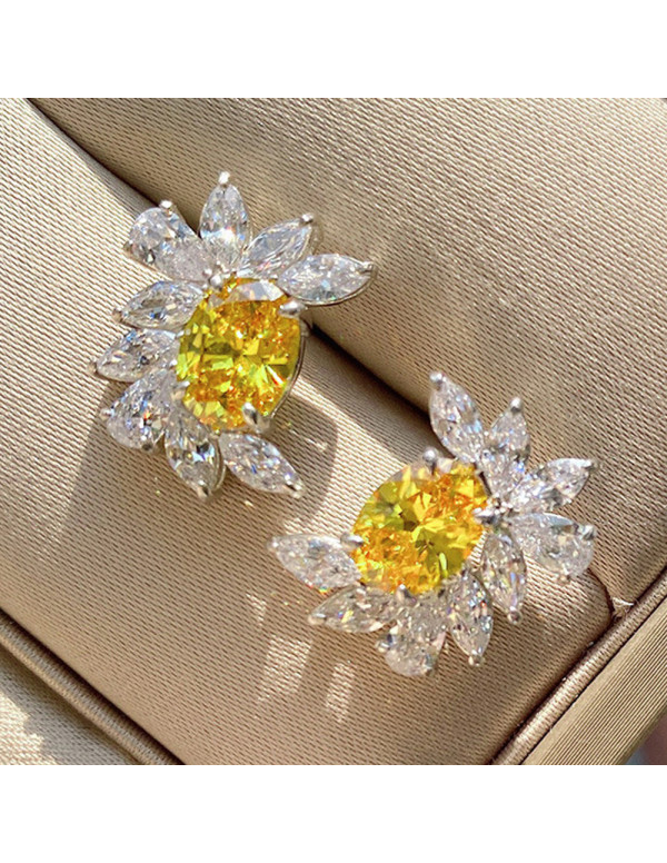 Jewels Galaxy Silver Plated American Diamond Studded Yellow Crushed Ice Cut Stud Earrings