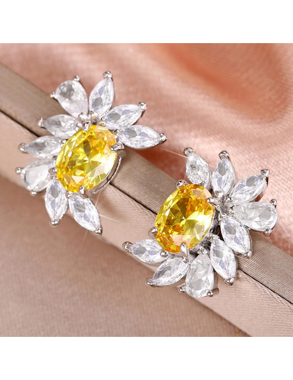 Jewels Galaxy Silver Plated American Diamond Studded Yellow Crushed Ice Cut Stud Earrings