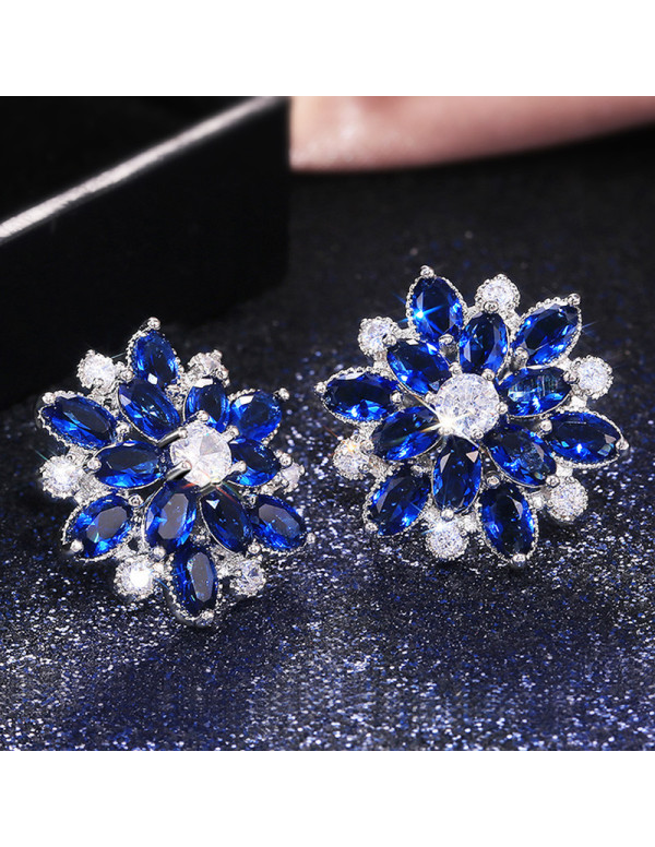 Jewels Galaxy Silver Plated American Diamond Studded Floral Blue Stud Earrings