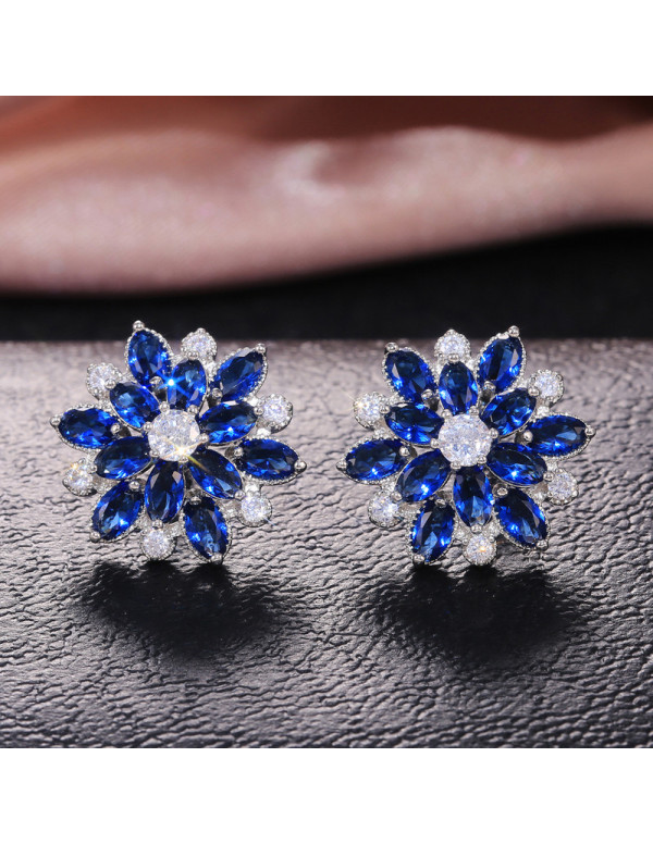 Jewels Galaxy Silver Plated American Diamond Studded Floral Blue Stud Earrings