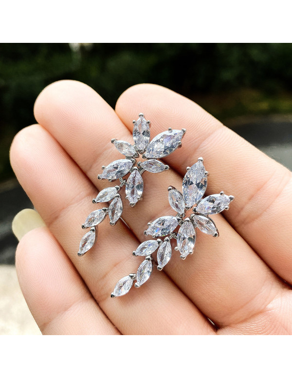 Jewels Galaxy Silver Plated American Diamond Studded Floral Themed  Drop Earrings