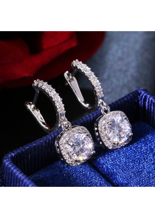 Jewels Galaxy Silver Plated American Diamond Studded Rectangular Crushed Ice Cut Drop Earrings