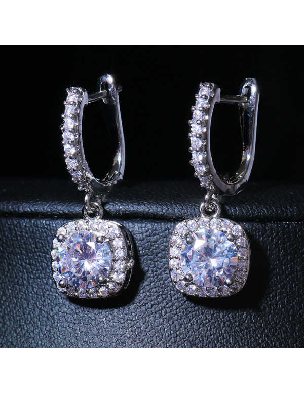 Jewels Galaxy Silver Plated American Diamond Studded Rectangular Crushed Ice Cut Drop Earrings