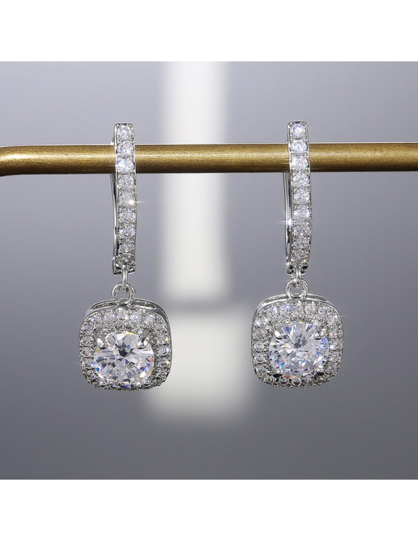 Jewels Galaxy Silver Plated American Diamond Studded Rectangular Crushed Ice Cut Drop Earrings